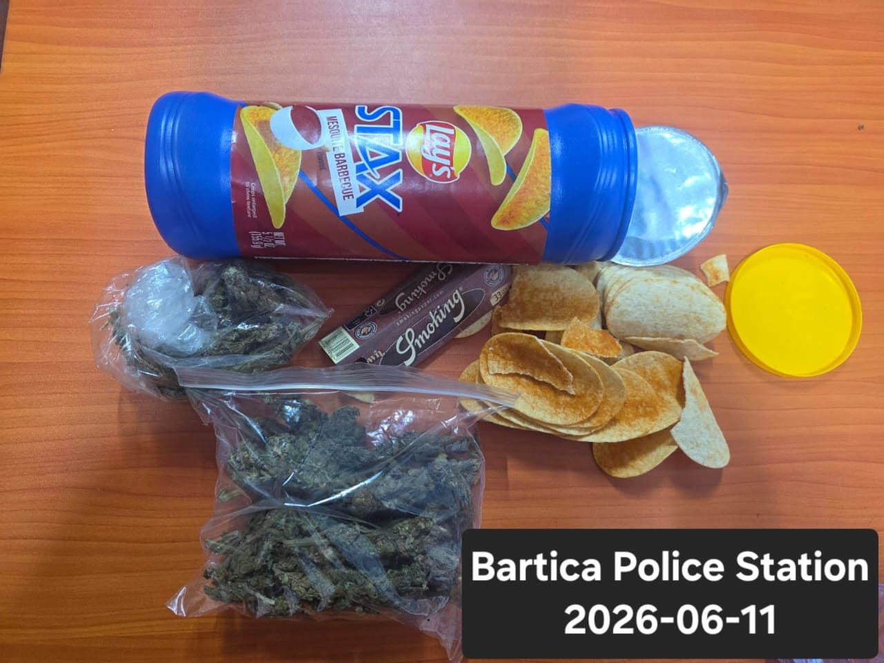 Two arrested for weed in chips container