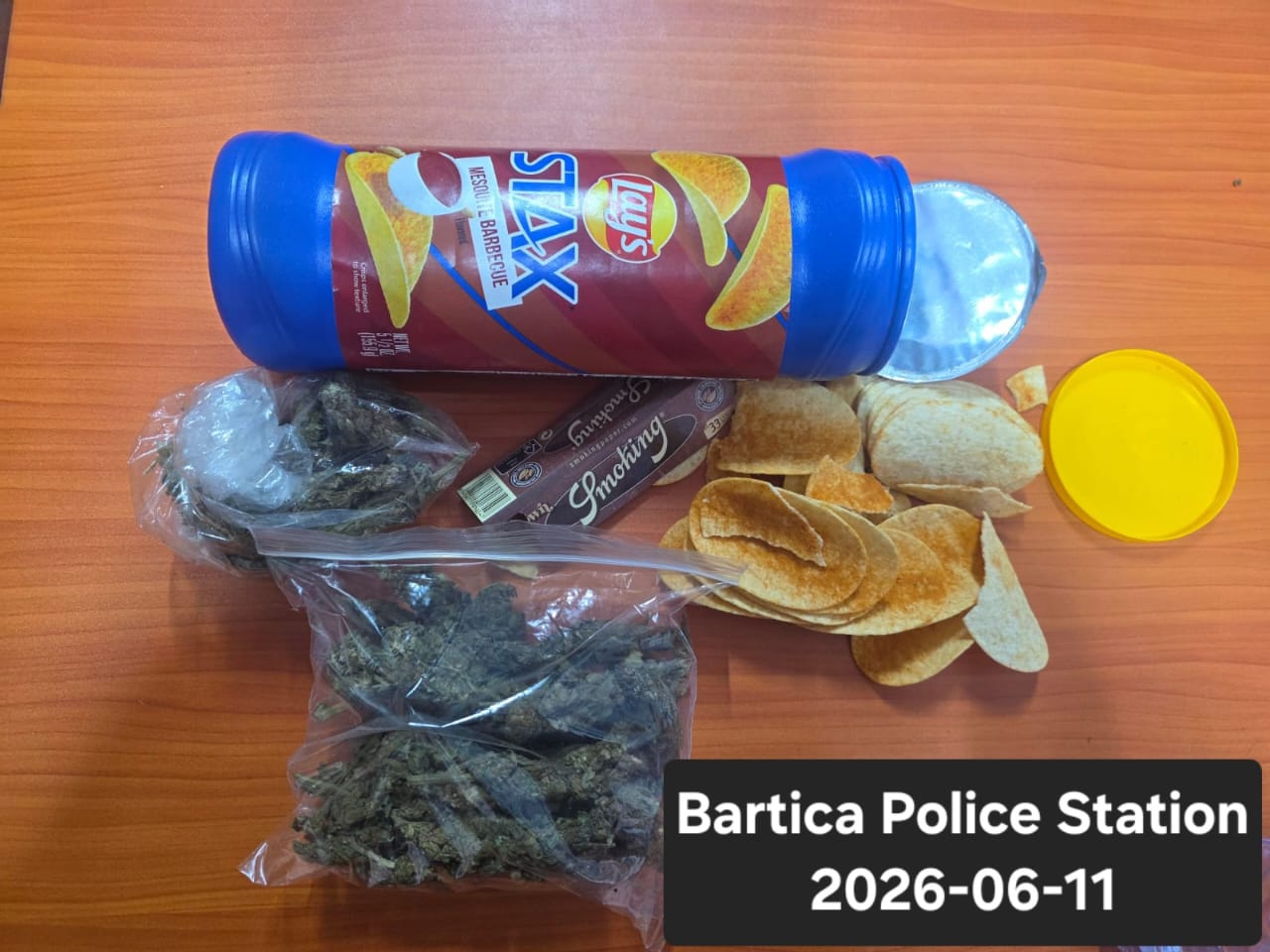 Two arrested for weed in chips container