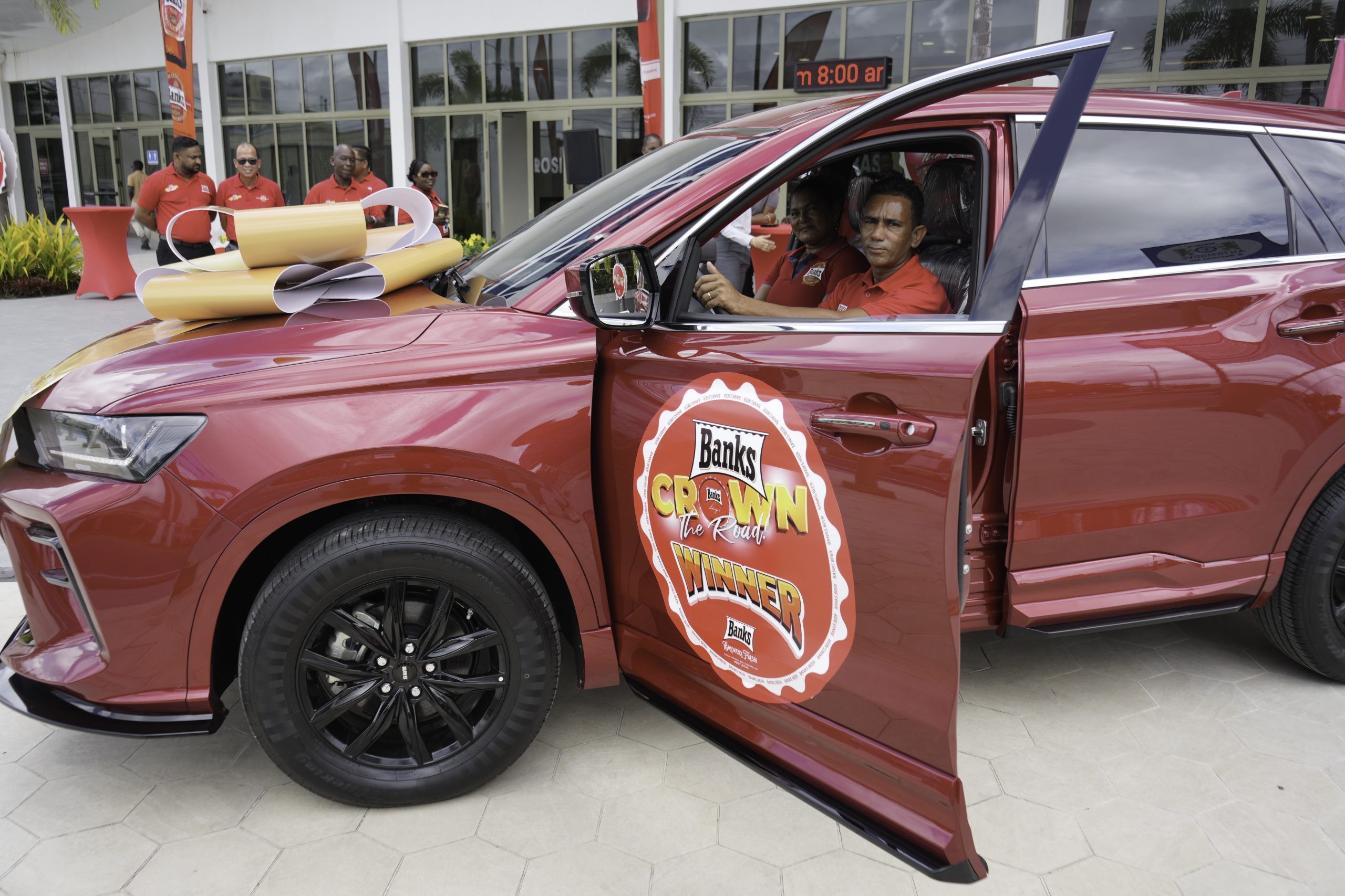 Banks DIH hands over grand prize SUV in “Crown the Road” promotion