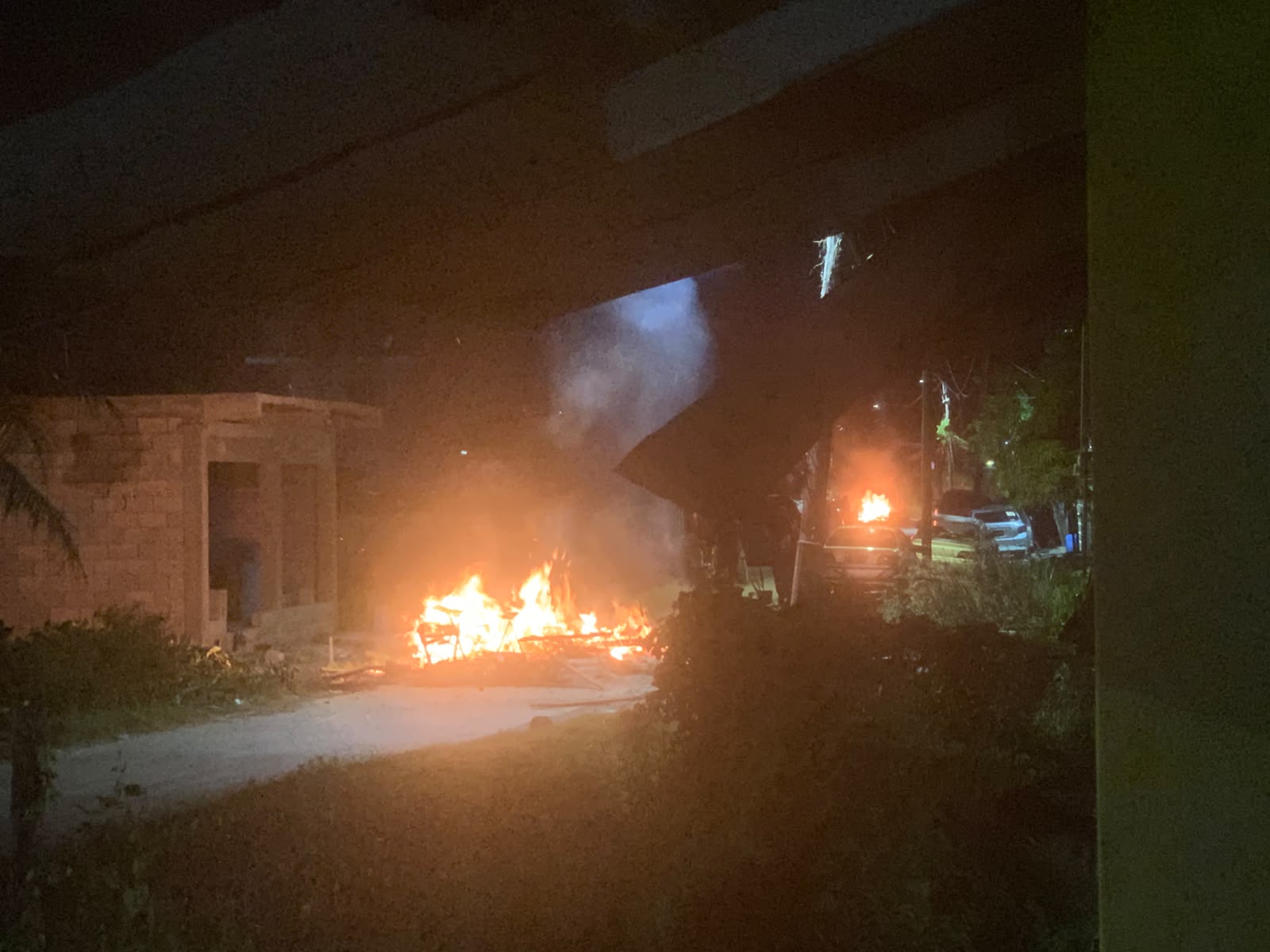 Unrest in Vigilance... villagers set truck ablaze as cops arrest wanted man’s family over missing Surinamese men