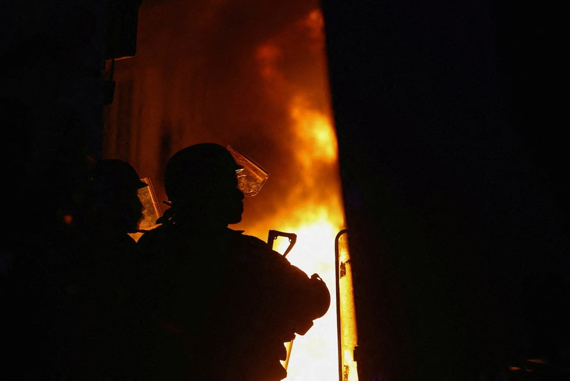 Violence flares in Paris after largely peaceful protests across France
