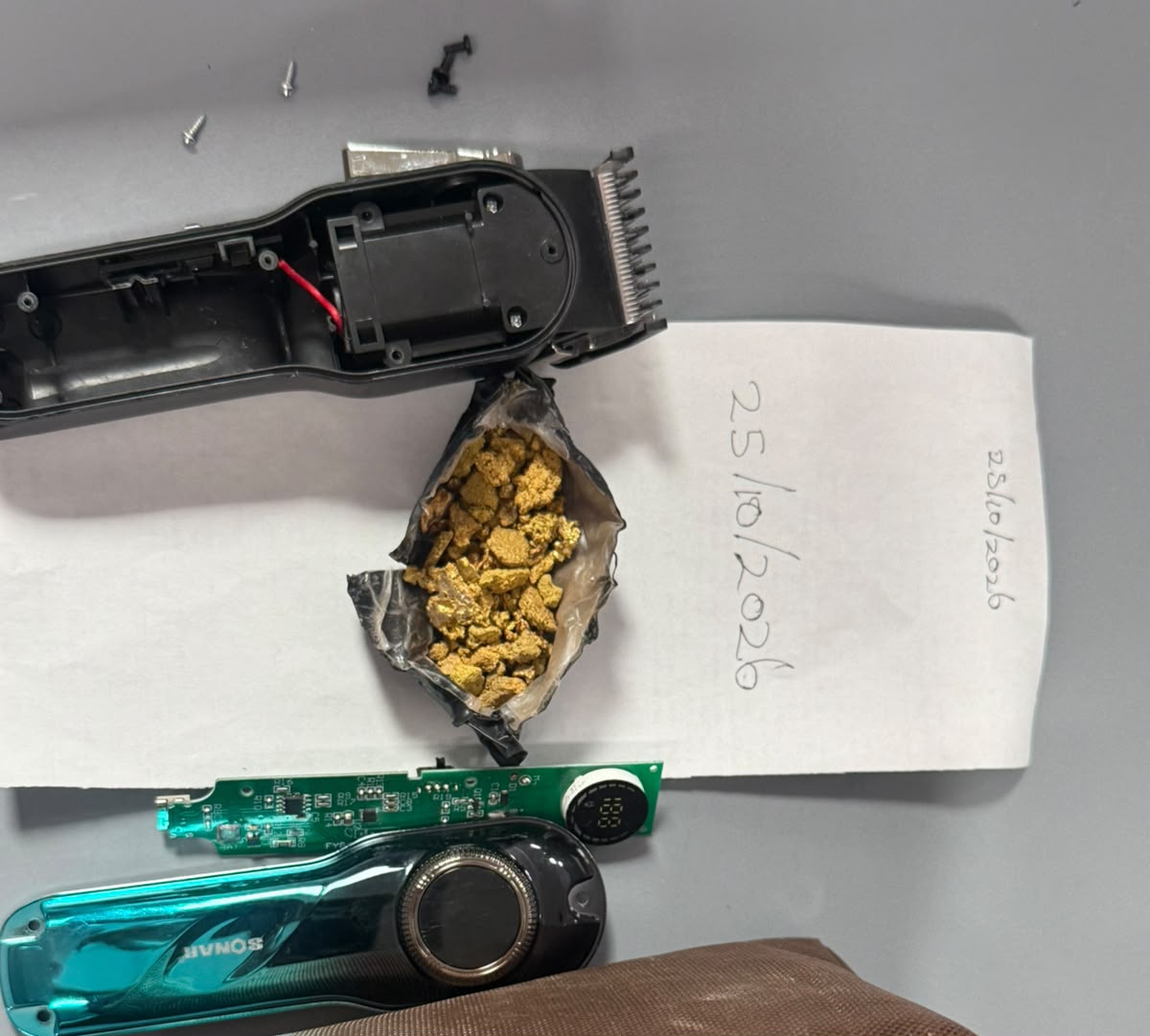Raw gold found stashed in haircutting machine at CJIA
